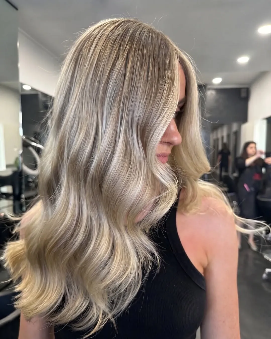 Hand-painted blonde balayage with a soft grow-out, Rokk Ebony Malvern.