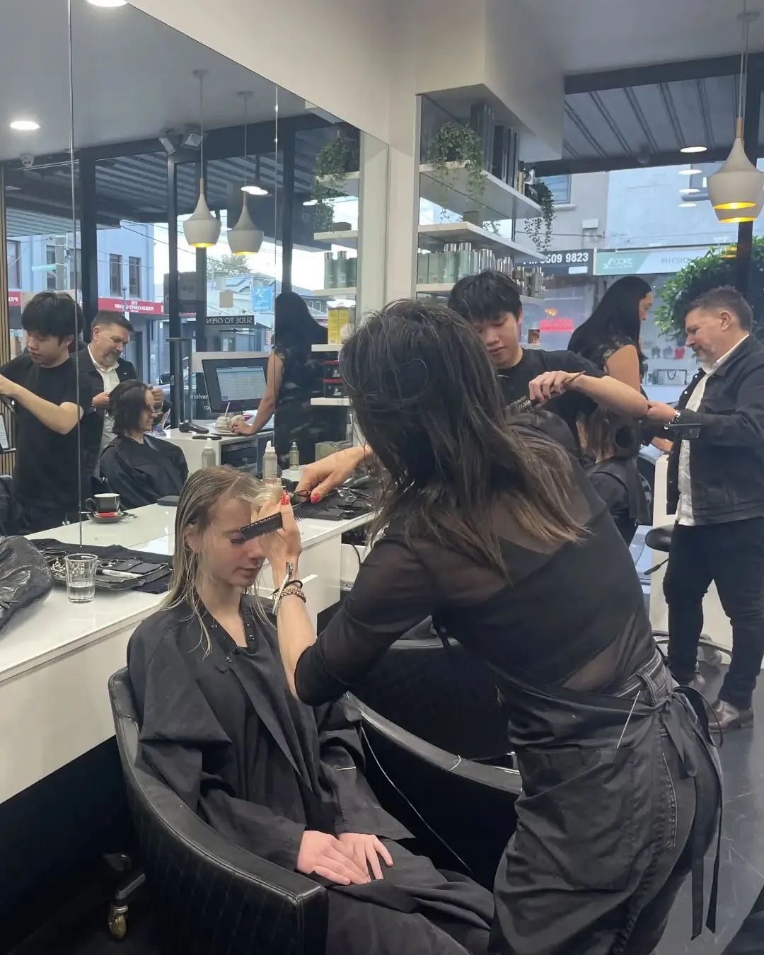 The Rokk Ebony Malvern team at work on the salon floor, 247 Glenferrie Road.