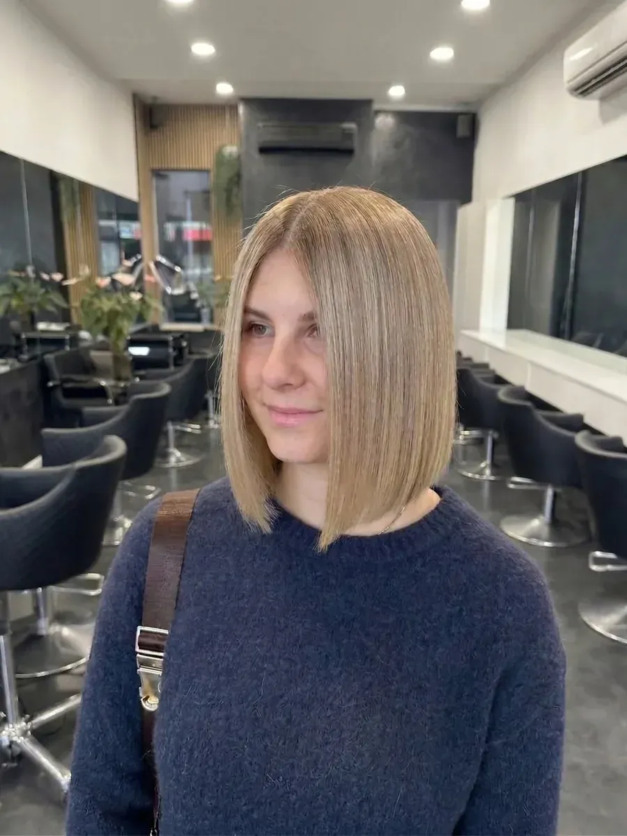 One-length blunt bob with a sharp perimeter, Rokk Ebony Malvern.