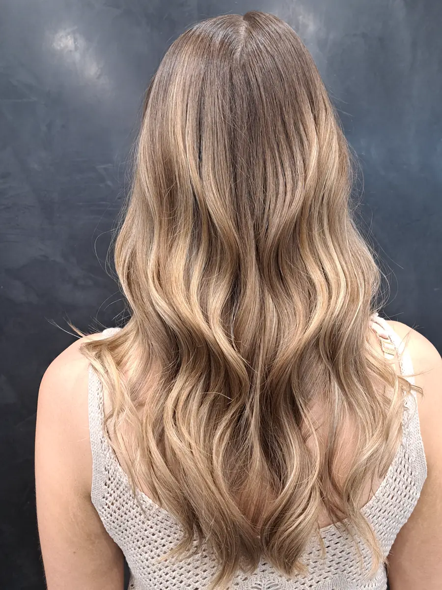 Back view of a bronde balayage showing the root-to-end graduation, Rokk Ebony Malvern.