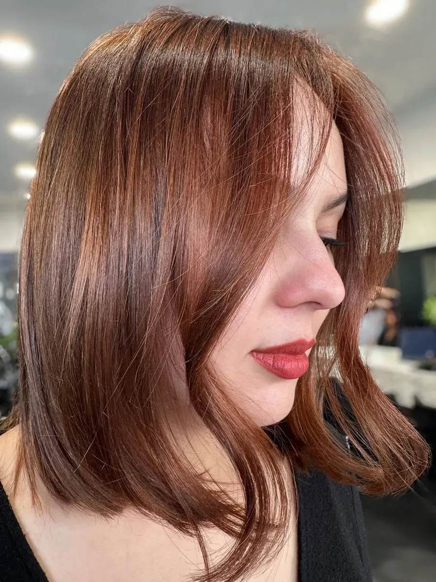Copper lob with face-framing layers, cut and coloured at Rokk Ebony Malvern.