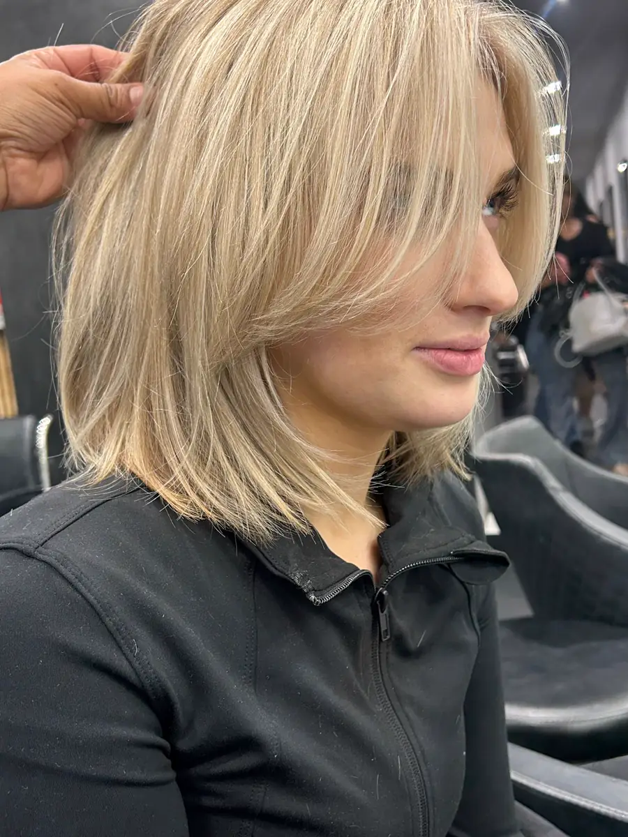 Textured blonde bob cut to the jaw, Rokk Ebony Malvern.